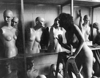 United States: A Nude Woman on a Ladder Chats with a Mannequin Head by Unbekannt Unbekannt